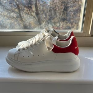 Alexander McQueen women's sneaker with red backing size 7.5. Mint condition